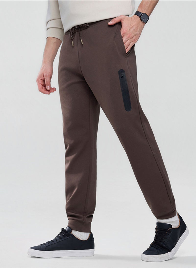 GIORDANO Men’s Slim Taper Cotton Stretch Jogger Pants - Image 1